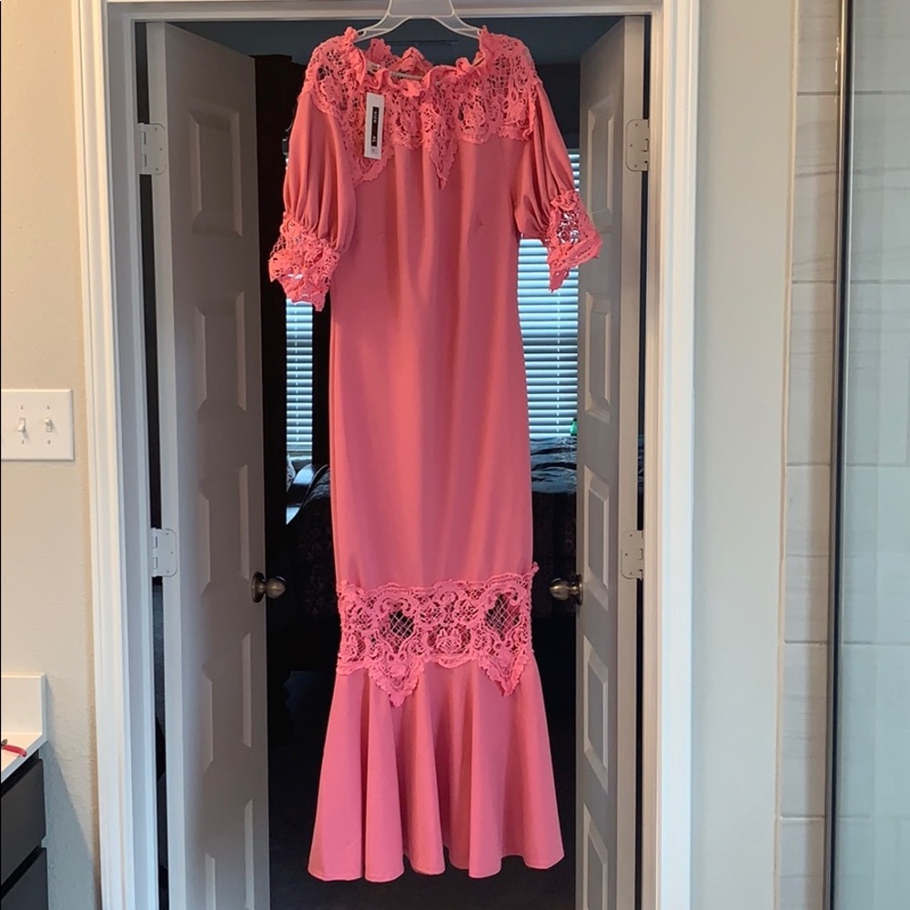 Pink mermaid style dress.